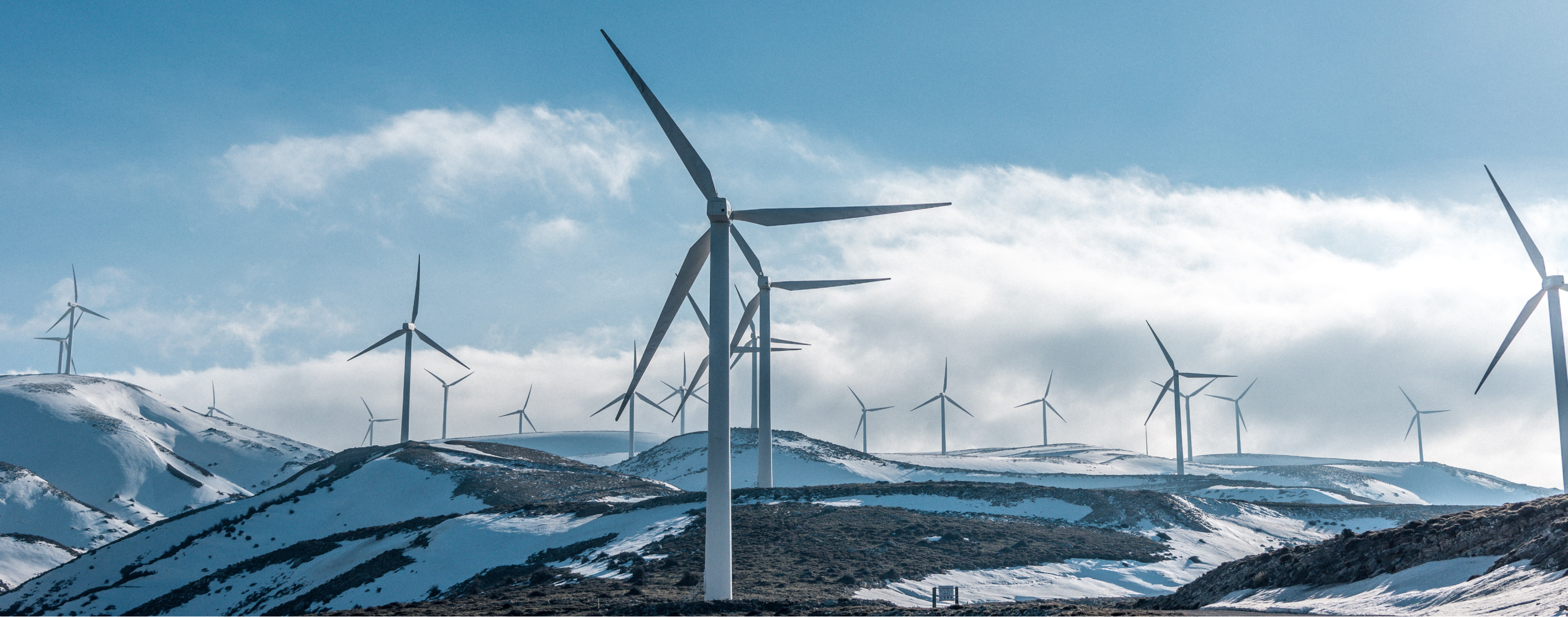 Wind turbines in the snow. Photo credit: Jason Blackeye